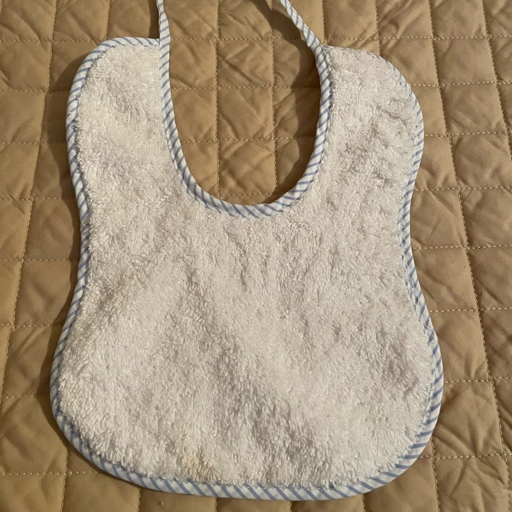 Handmade Bib white with blue trim, tie closure, brand new.